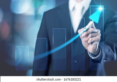 Businessman pointing arrow graph corporate future growth plan
