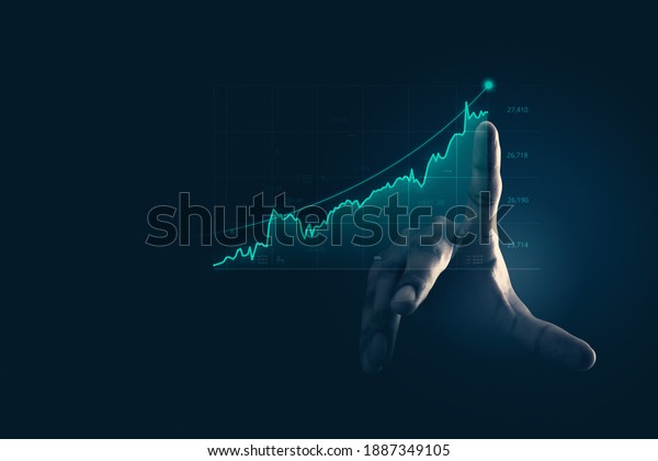 Businessman pointing chart financial goals and\
economic business planning\
global.
