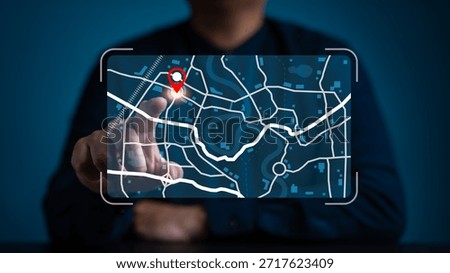 Businessman pointing at a digital map interface with a red location pin. Concept for GPS navigation, logistics tracking, smart city technology, route planning, and geographical search data.