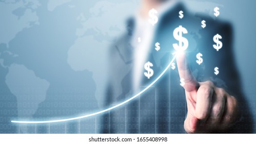 Businessman Pointing Dollar Currency Icon With A Map And Graph Growing Growth, Concept Online Transaction Application For Ecommerce And Internet Investment