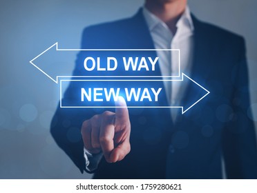 Businessman pointing Old Way vs New Way arrow.
 Improvement and change management. Business concept.