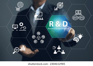The businessman pointing to Research and development or R and D to remine new product development process explains the importance of each step of work before new product can be released to the market.