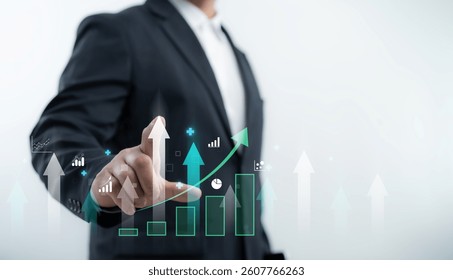 Businessman pointing at rising bar chart with upward arrows representing financial growth marketing strategy and business success visualization