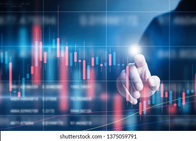 Businessman pointing the screen and analysing financial data. Concept of a digital diagram, graph interface, virtual screen, technical price indicator, trading online, global market, broker at work