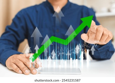 businessman pointing at Trading bar graph grow up. Stock exchange marketing analyzing chart. information statistics diagram profit. investment and marketing concept. - Powered by Shutterstock