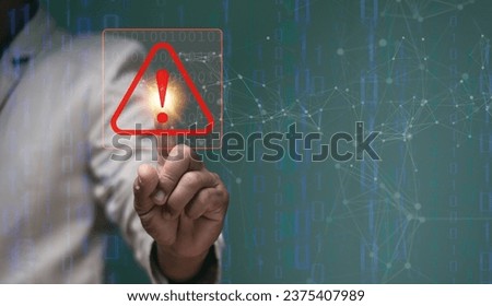 Businessman pointing to triangle caution warning sign for notification error and maintenance concept, Digital link technology, cyber security, hacker attacks warning, Ransomware, Phishing, Spyware.