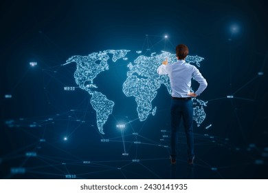 A businessman points to a glowing digital world map on a dark blue background, suggesting global connectivity and strategy