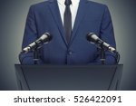 Businessman or politician making speech from behind the pulpit