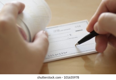 Businessman Prepare Writing Check In The Office