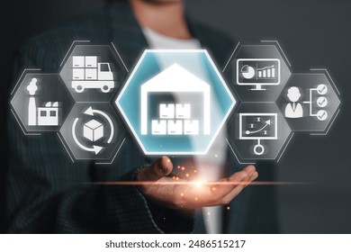 A businessman presenting digital icons representing the stages of Product Lifecycle Management, including logistics, production, and strategy. - Powered by Shutterstock