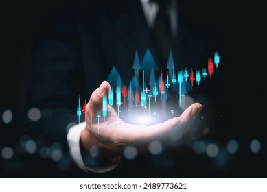Businessman presenting financial growth chart. Emphasis on upward trend, symbolizing success. Suitable for finance, investment, corporate presentations. - Powered by Shutterstock