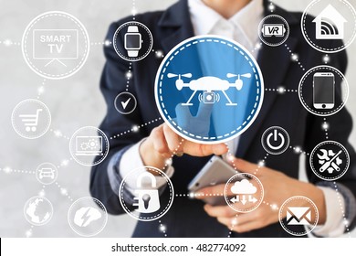 Businessman presses drone sign. Businesswoman touched quadrocopter icon with camera. Fly delivery button, remote control with smartphone. Network, online, buy, internet shopping, smart home.