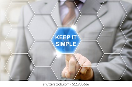 businessman presses keep it simple word on virtual hexagon screen. Success business concept template empty blank mock up. Company, strategy, technology, finance, work concept.