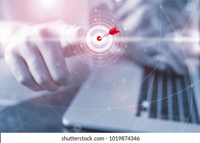 Businessman pressing button goal on digital virtual screen, Success concept, new technology and connection maps on the background.