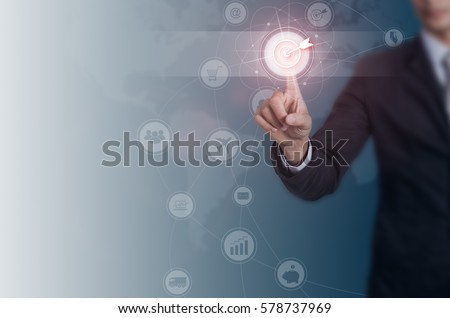 Businessman pressing button goal on virtual screen, networking concept.