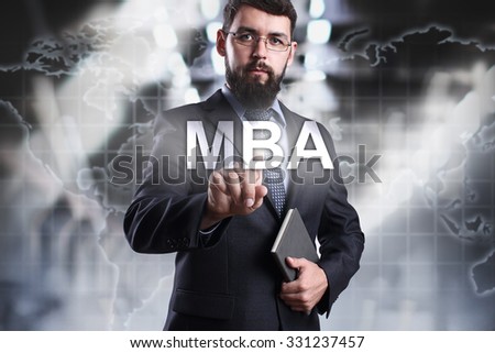 Businessman pressing button MBA on the virtual screen. Business, internet and technology concept.