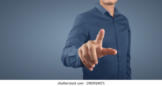 Businessman pressing button virtual screen. Hand pointing futuristic interface - Powered by Shutterstock
