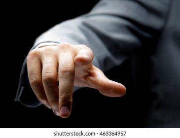 Businessman pressing an imaginary button - Powered by Shutterstock