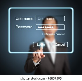 Businessman Pressing Login Button On Internet Sign In Page On Computer Screen