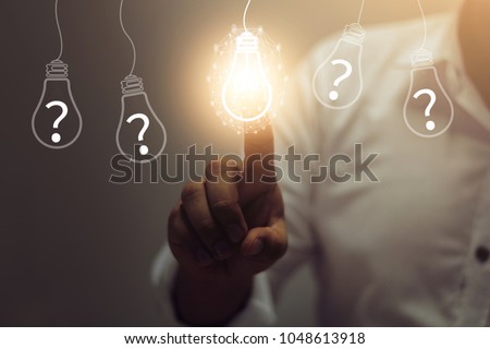 
Businessman pressing Mark answer and question concept with hand pressing a button 
