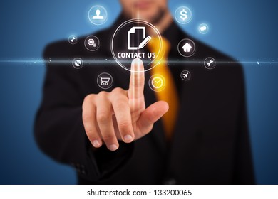 Businessman pressing messaging type of modern icons with virtual background - Shutterstock ID 133200065