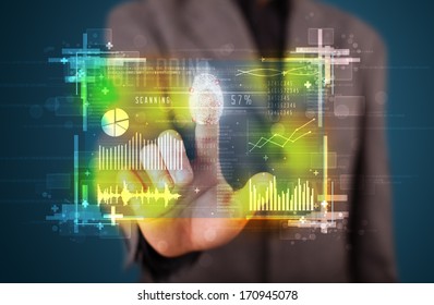 Businessman pressing modern technology panel with finger print reader  - Shutterstock ID 170945078