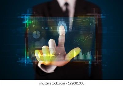 Businessman pressing modern technology panel with finger print reader 