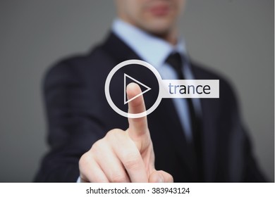 Businessman Pressing Play Trance Music Button 