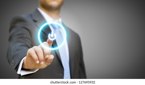 Businessman Pressing Power Button Concept