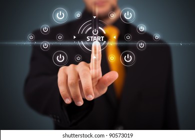 Businessman pressing simple start buttons on a virtual background