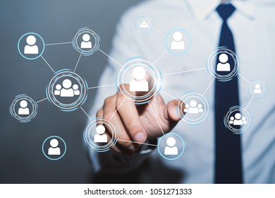 Businessman Pressing a Social Networking Button - Shutterstock ID 1051271333