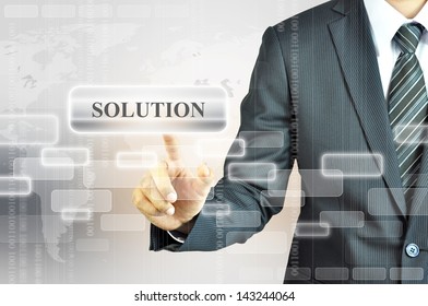 Businessman pressing SOLUTION button