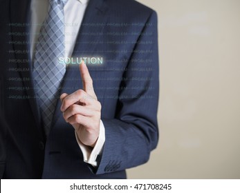Businessman pressing solution concept button