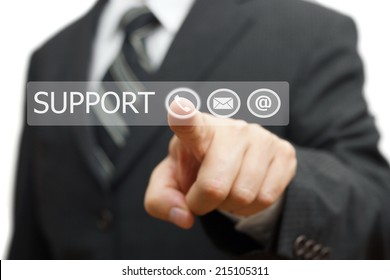 Businessman pressing virtual ( mail,phone,email ) buttons. support concept