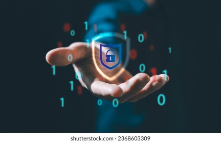 Businessman protecting personal data on smart app, virtual screen interfaces. cyber security.Cybersecurity and privacy concepts to protect data. Lock icon and internet network security technology.  - Shutterstock ID 2368603309