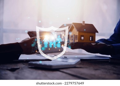 Businessman with protective gesture and family, life, health and house insurance icons. Insurance concept, Family life insurance and policy concepts.