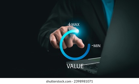 Businessman is pulling up circle progress bar with the word VALUE on dark tone background, value added or business growth concept, increase value, Growth value.