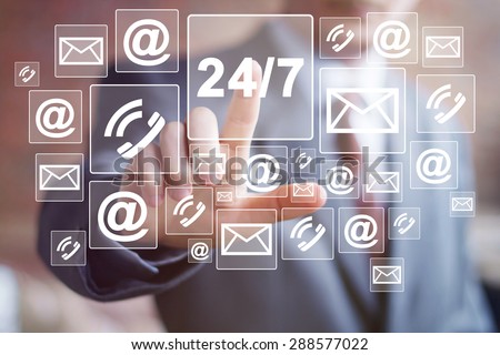Businessman push button 24 hours service network mail