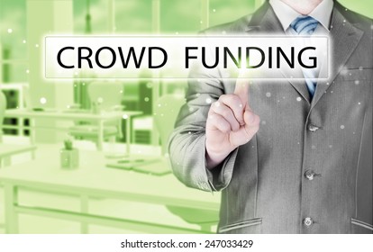 Businessman Pushes Virtual Crowd Funding Button