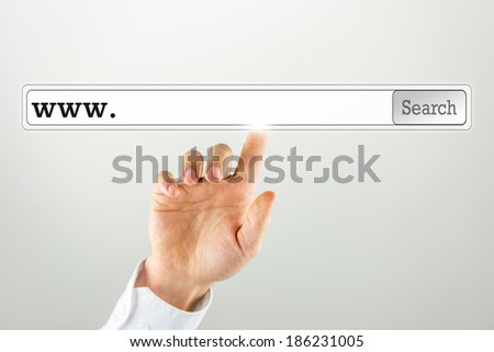 Businessman pushing a search bar on a virtual computer screen. Empty space ready for your web address or keywords.