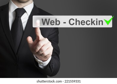 Businessman Pushing Virtual Button Web Checkin Airport