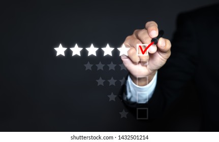 Businessman Putting Check Mark A Checkbox On Five Star Rating. Increase Rating Company Or Ranking, Evaluation And Review Concepts