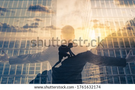 Businessman reaching for success and overcoming obstacles concept. 
