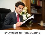 Businessman reading his agenda