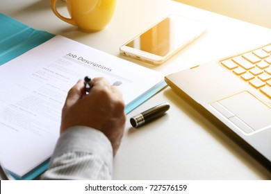 businessman Reading job description paper In office. - Shutterstock ID 727576159
