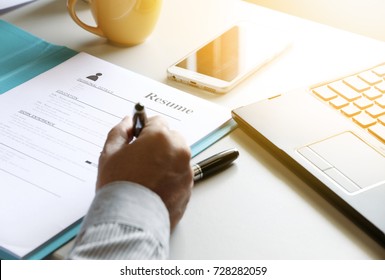 businessman Reading resume paper In office. - Shutterstock ID 728282059