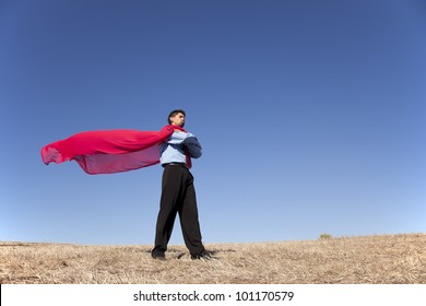 Businessman With A Red Flying Cape Like Superman