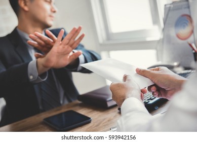 Businessman Rejecting Money In White Envelope - Anti Bribery And Corruption Concepts