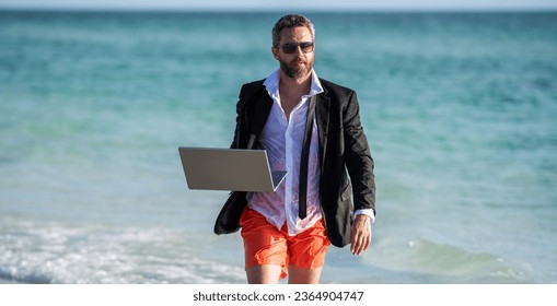 businessman relax at beach. businessman in suit with laptop in summer. Businessman dreams on summer business in sea. Summer business. Businessman relaxing at beach. Remote working. find inner peace - Shutterstock ID 2364904747
