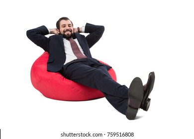 Businessman Relaxing On Bean Bag Chair, Isolated On White